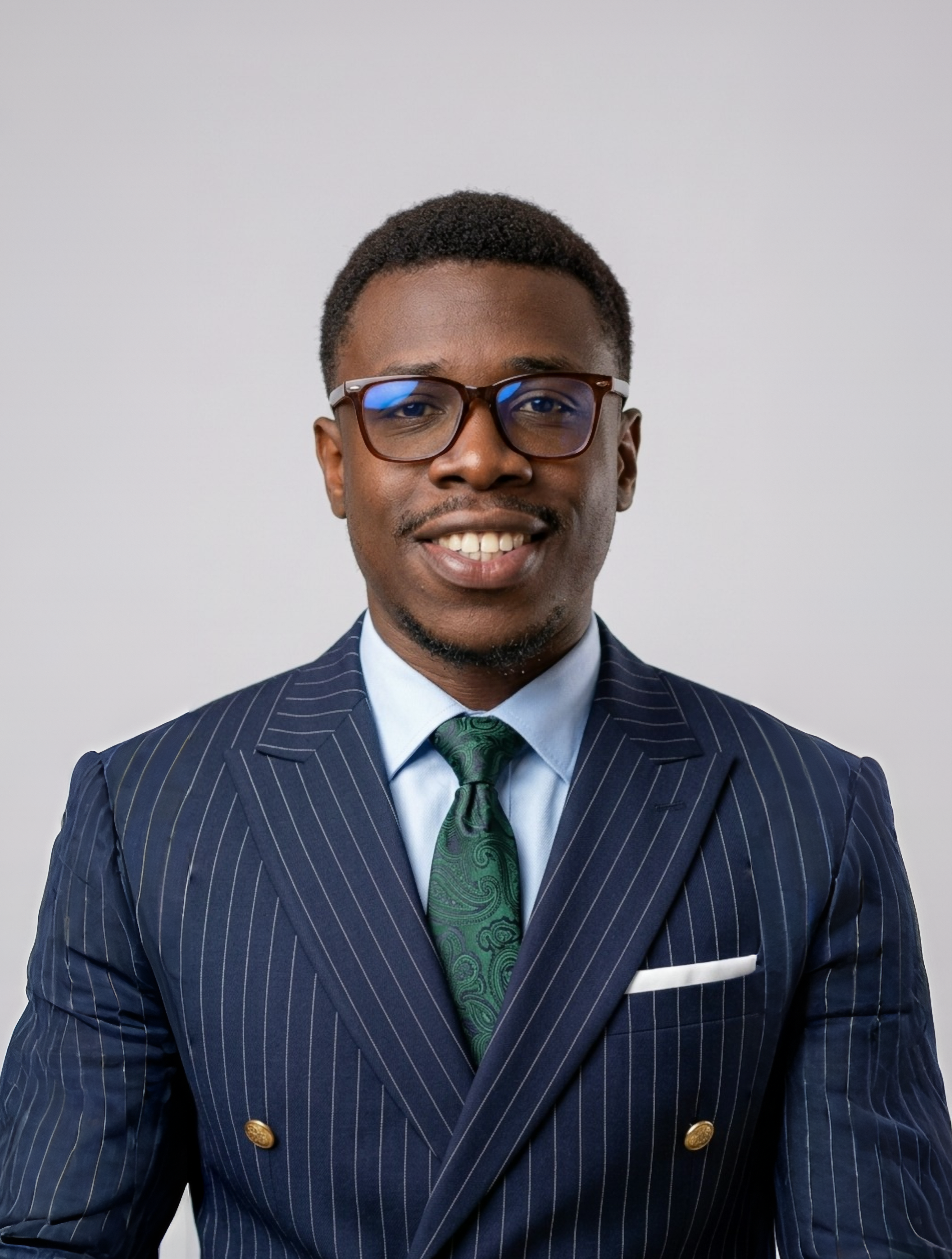 Pastor Ayanfe Dideoluwa in striped suit